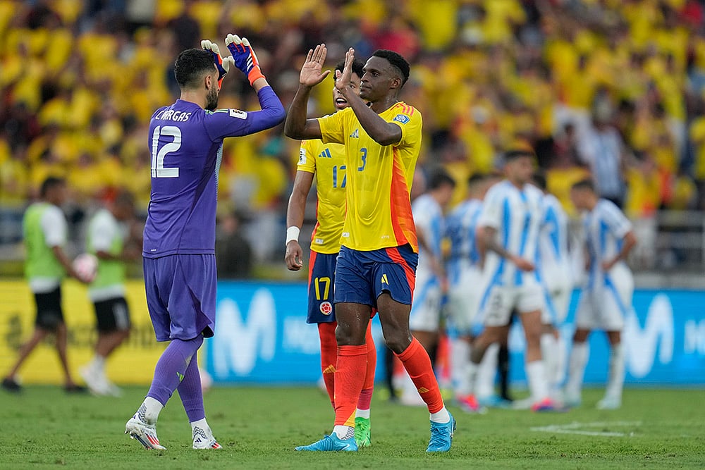 | Photo: AP/Fernando Vergara : 2026 FIFA World Cup Qualifying, Colombia vs Argentina: Colombia players celebrate at the end of a match against Argentina